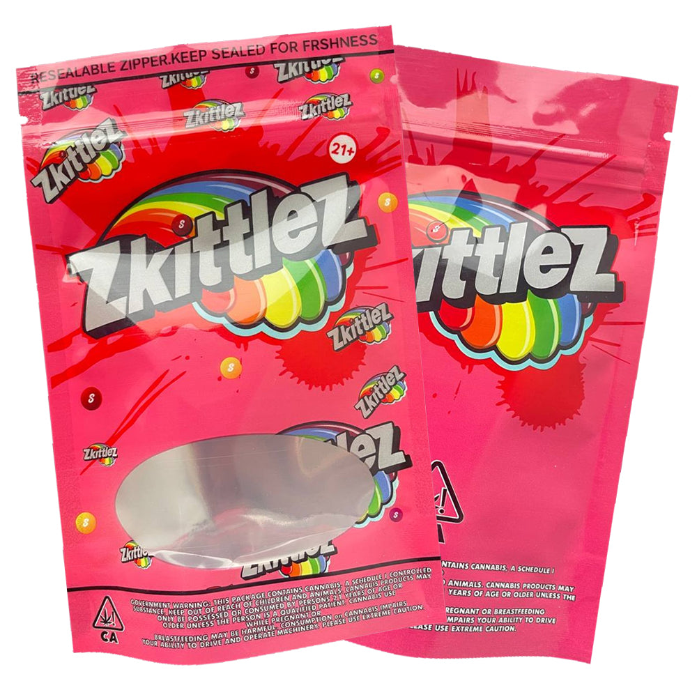 Two pink cali packs mylar bags 3.5g Zkittlez candy on a white background
